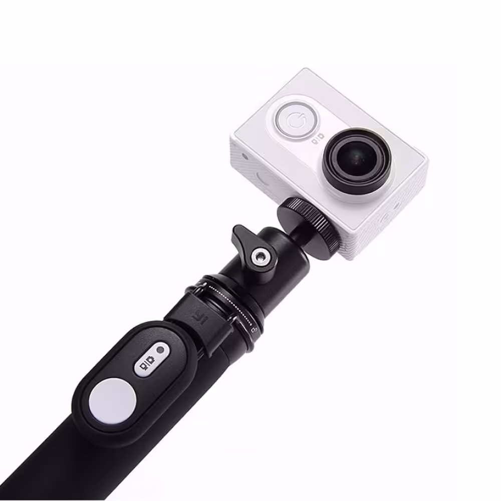 دوربین ورزشی با دسته نگهدارنده و ریموت بلوتوثی شیائومی مدل YI Travel Edition