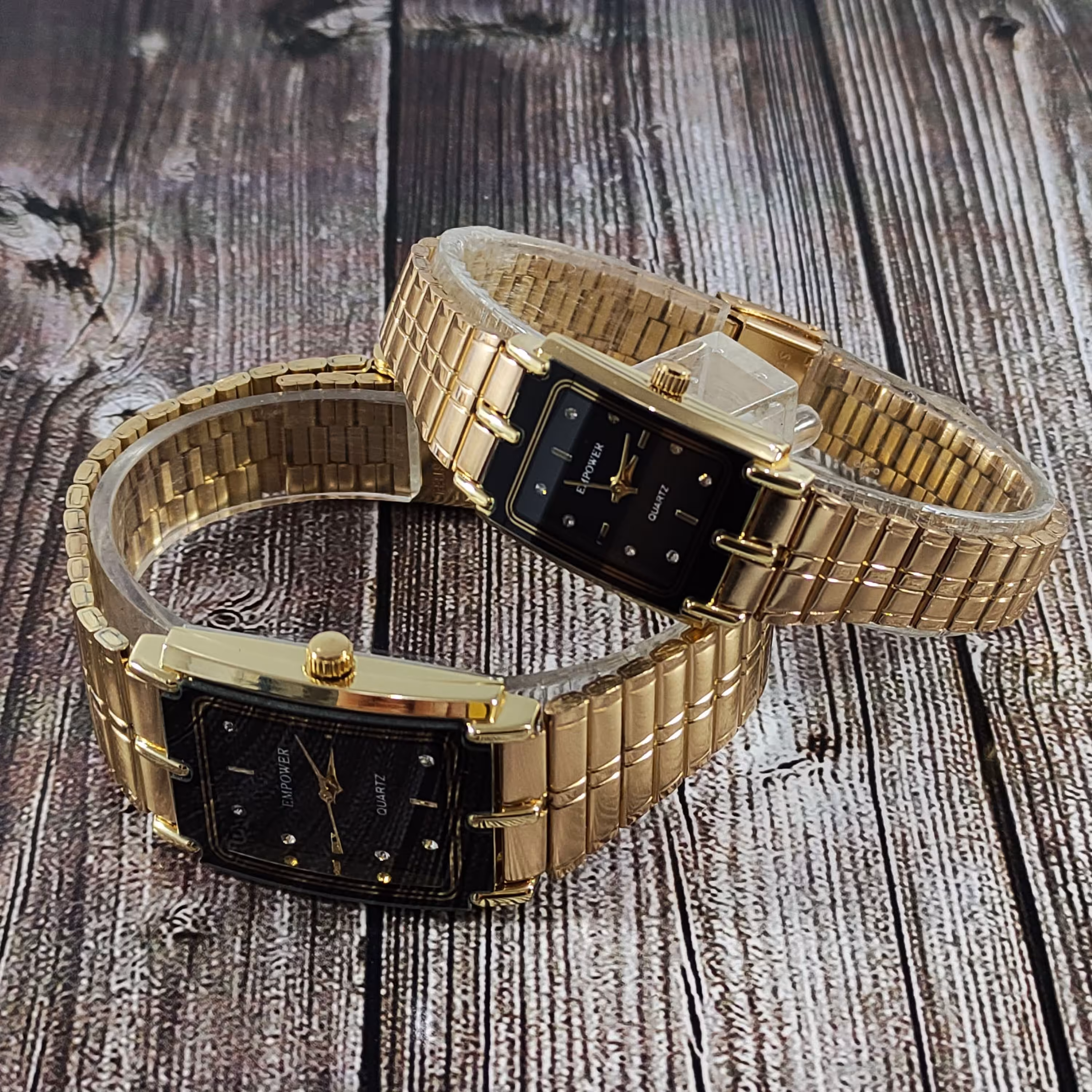 ساعت ست امپاور empower طلایی زمینه مشکی