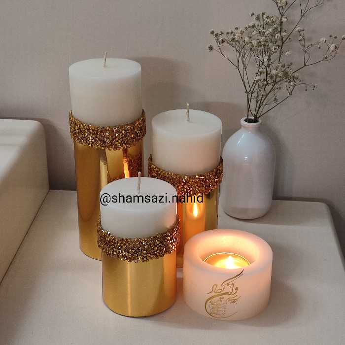 شمع  استوانه وگل و یا فانوسی وان یکاد 4عددی طلایی 