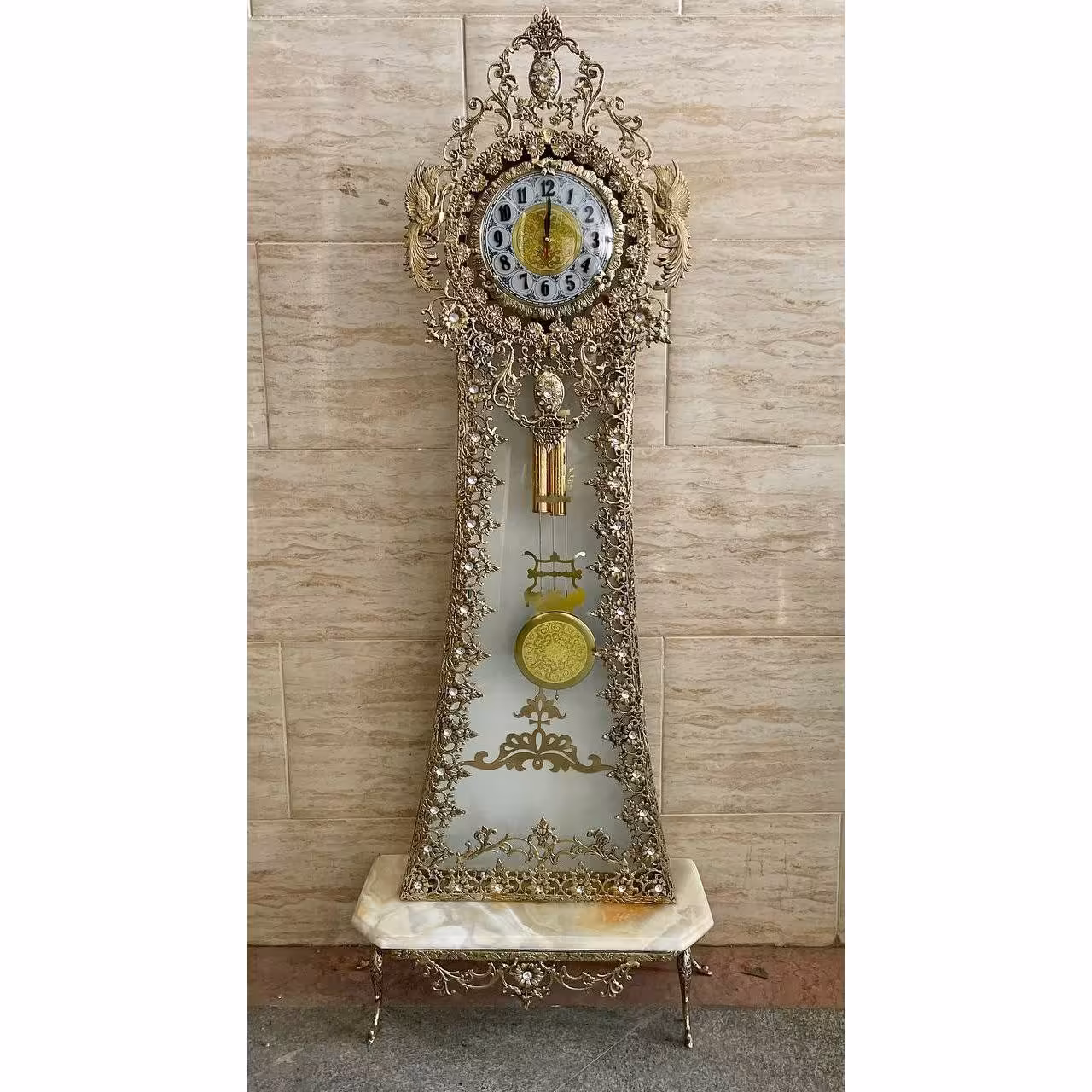 ساعت های پایه سنگی سنگین مدل افتابگردان نیزه ای ومدل گل رز  با ضمانت تماما برنج