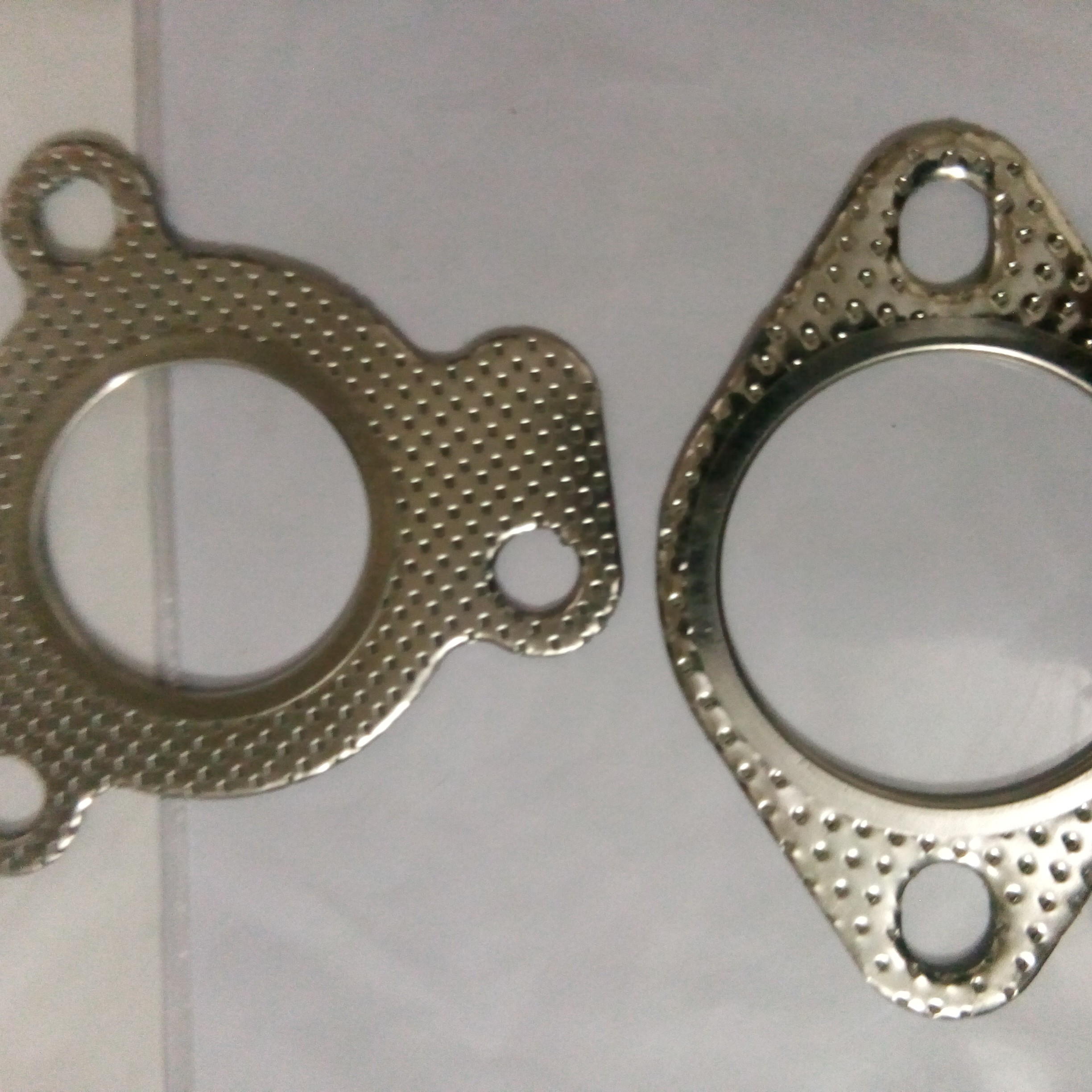 واشر  اگزوز  دو پیچ و سه پیچ طرح فلزی پراید هرکدام تکی و جداگانه  با کیفیت عالی یدک چی