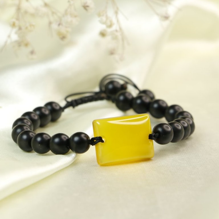 🌕 شرف الشمس 🌕
دستبند اونیکس مات و میانکار عقیق زرد شرف الشمس 
