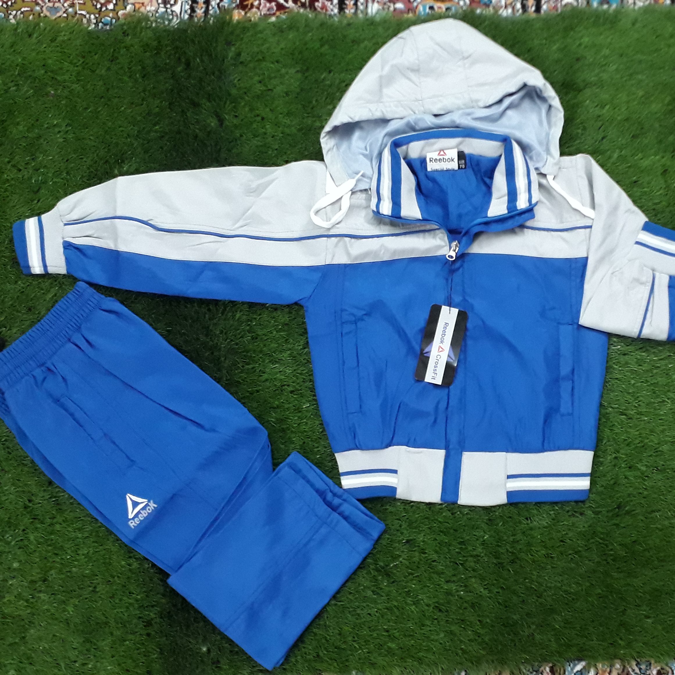 ست کاپشن و شلوار ورزشی بچگانه بادگیر آبی