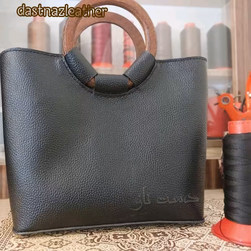 کیف دسته چوبی دست دوز  چرم طبیعی گاوی فلوتر با آستر سومیت 