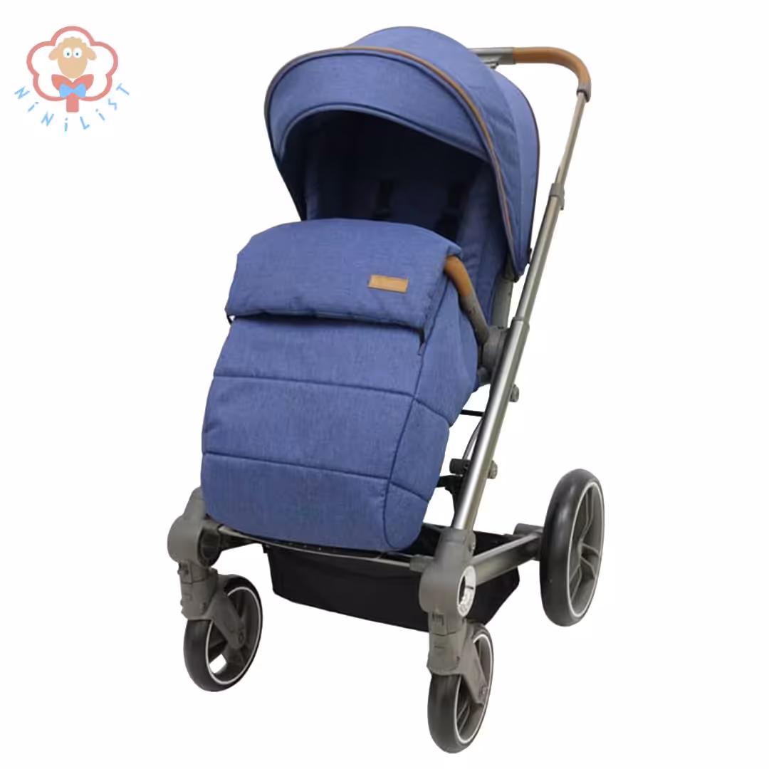 کالسکه کریر جدید ولتک المان رنگ سورمه ای با چرم دوزی قهوه ای روشن   ساخت کشور المان با ساک لوازم و کاور باران و گرم کن پا و گارانتی (بهترین و لاکچری ترین مدل سرویس کالسکه ولتک المان )    volltek