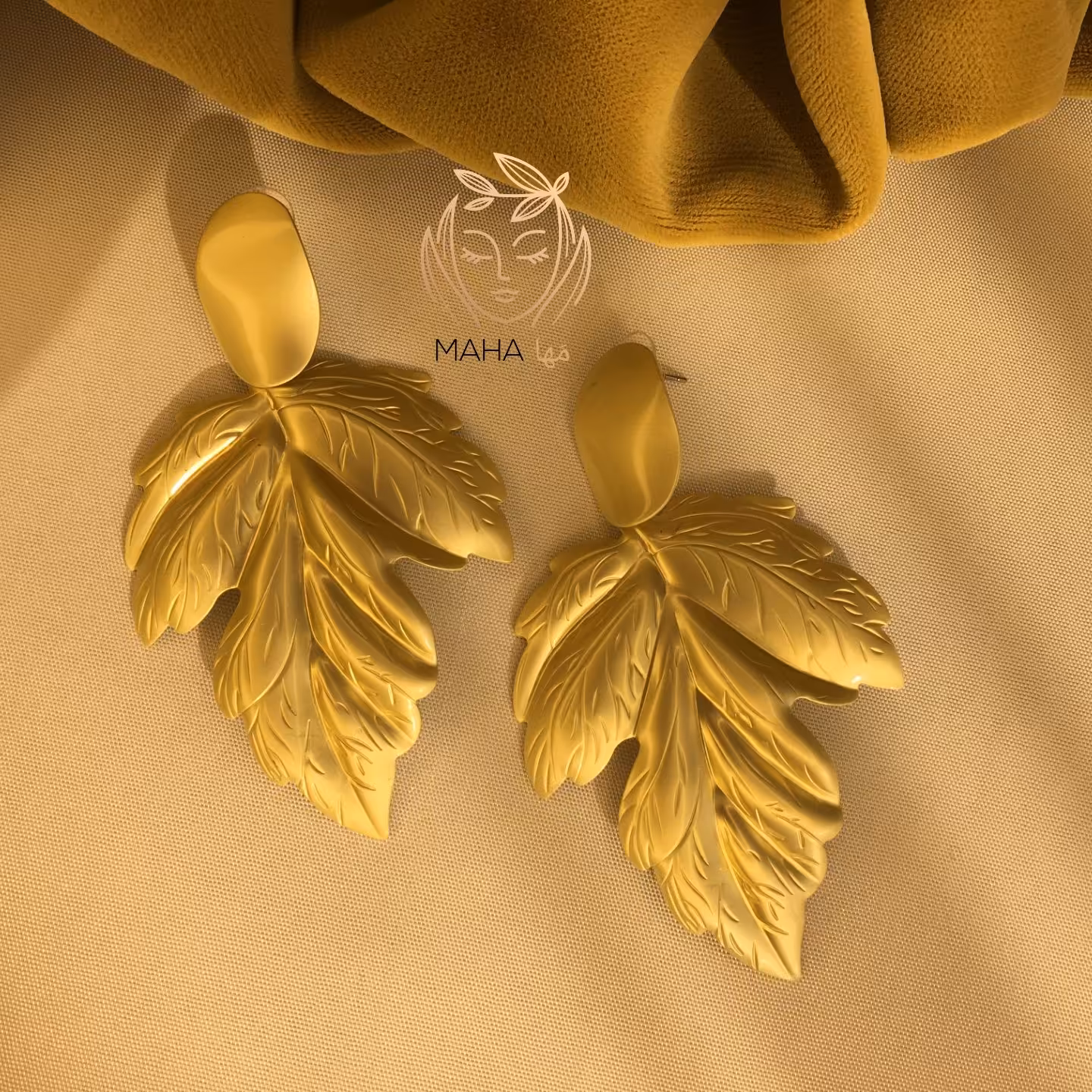 گوشواره طلایی طرح برگ