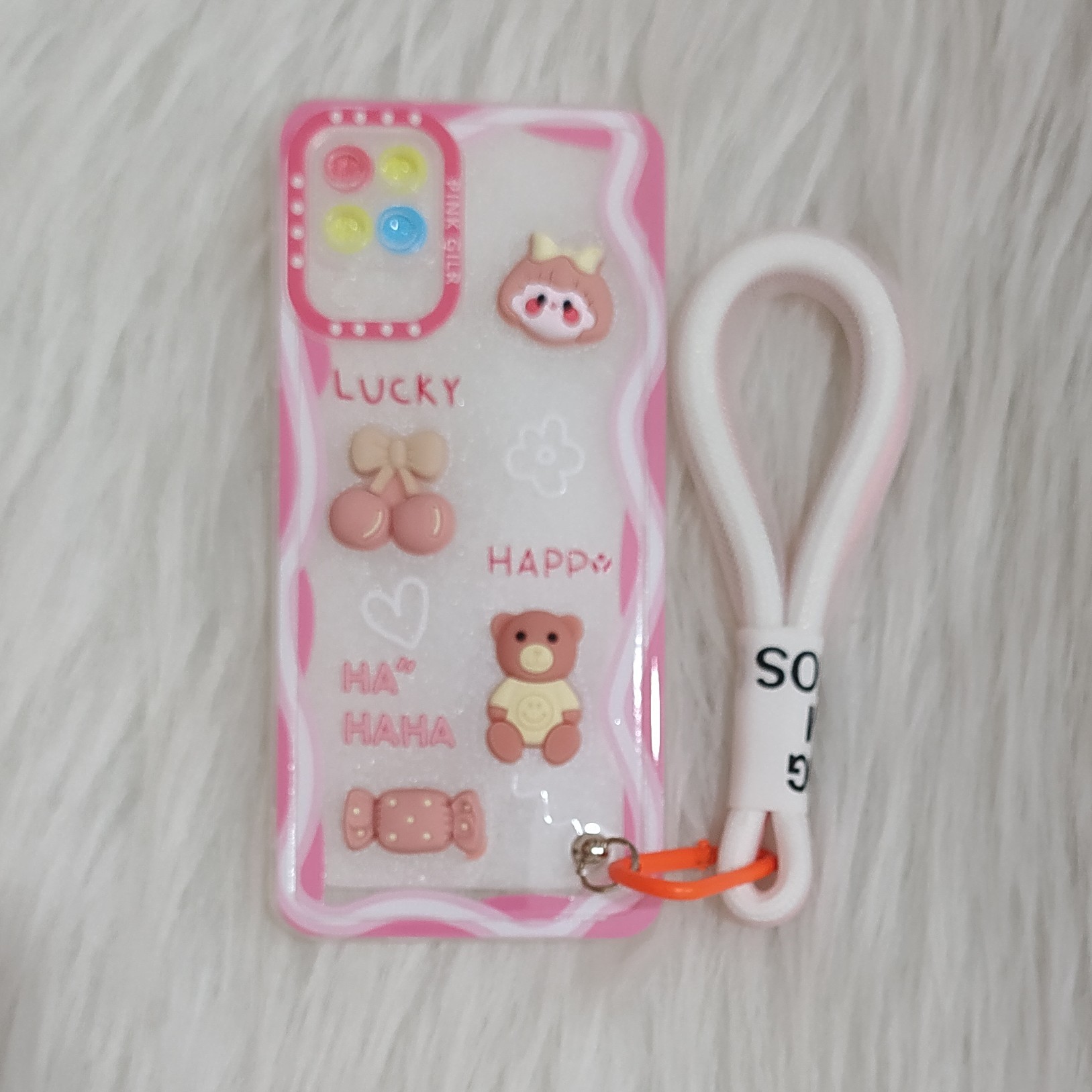 گارد سامسونگ A12 ژله ای شفاف عروسکی برجسته به همراه بند آویز محافظ لنز دار  happy