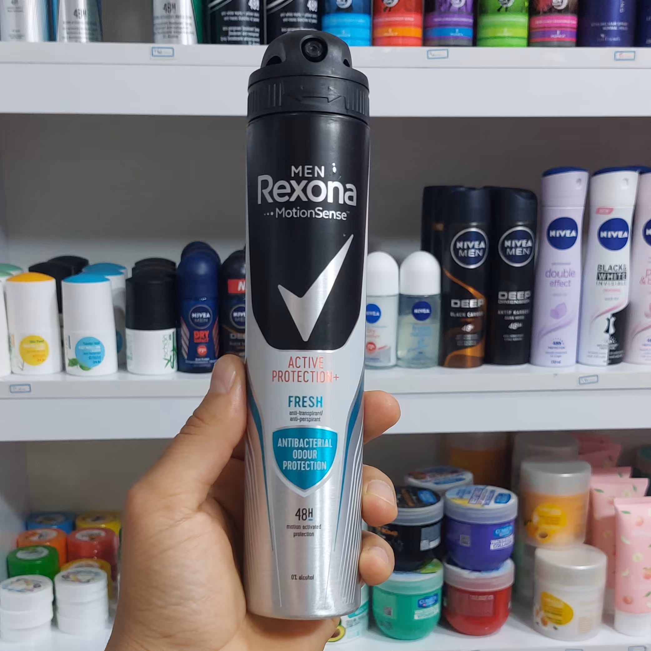 اسپری رکسونا مردانه پروتکشن اکتیو آبی