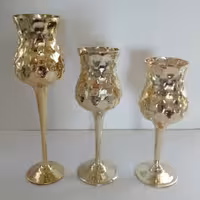 شمعدان سه تایی طلایی شیشه ای
