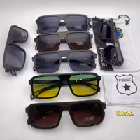 عینک آفتا بی پلیس دسته چوب کد 5063پلاریزه تلق 1/1 ؛همراه با کیسه ودستمال مخصوص پلیس 