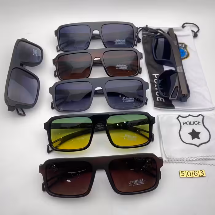 عینک آفتا بی پلیس دسته چوب کد 5063پلاریزه تلق 1/1 ؛همراه با کیسه ودستمال مخصوص پلیس 