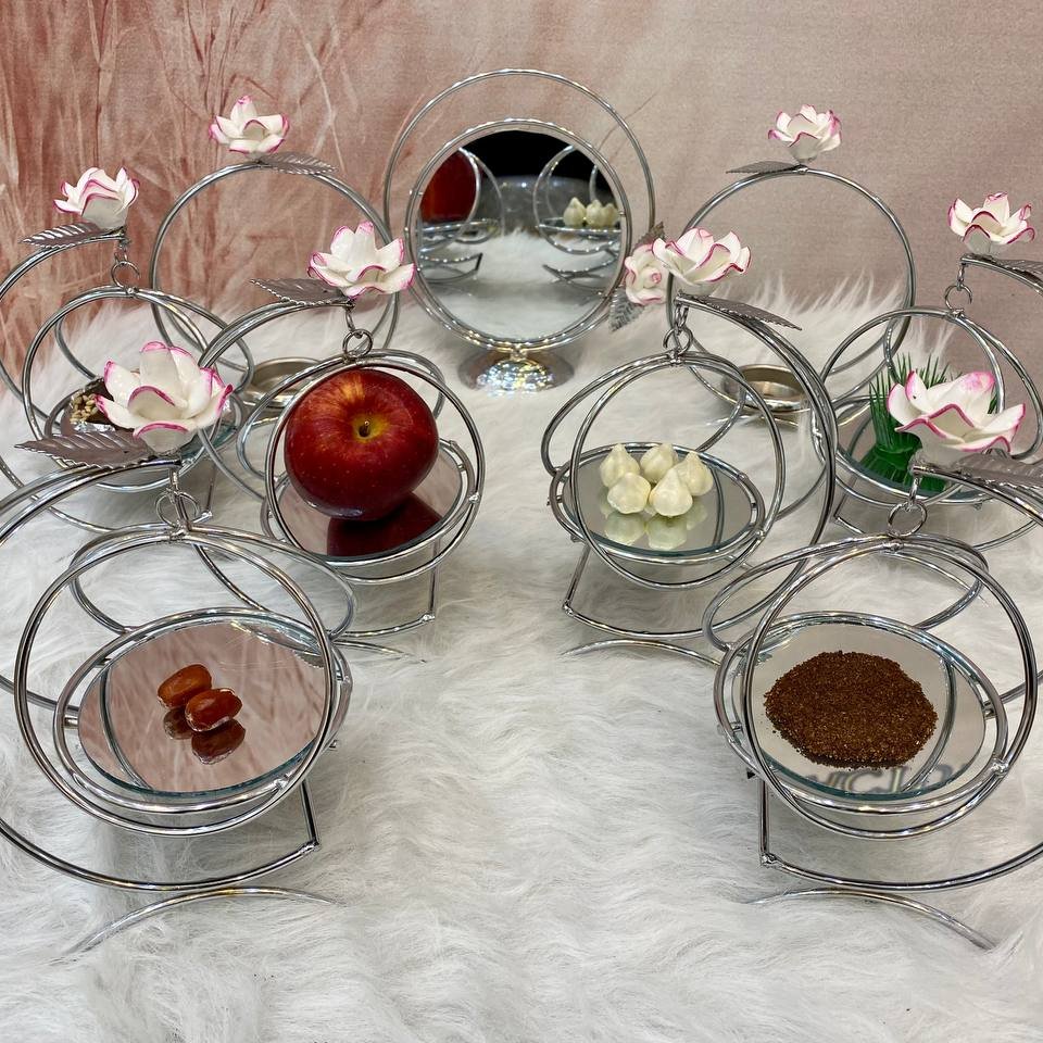 🔱 نام کالا : هفت سین طرح تاپی 
🔱 گلدار 
🔱جنس کالا : فلز آبکاری پرداخت شده
🔱 هزینه ارسال به عهده مشتری وپسکرایه