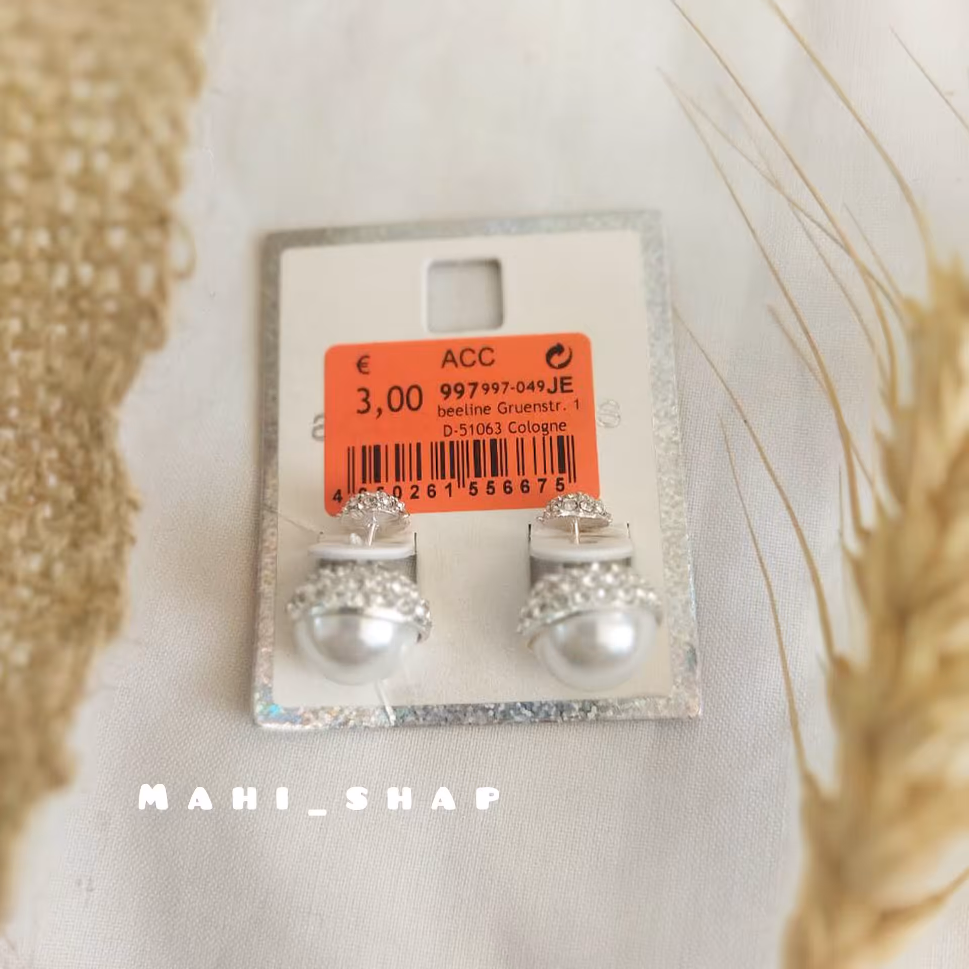 گوشواره مرواریدی و نگینی براق دو طرفه