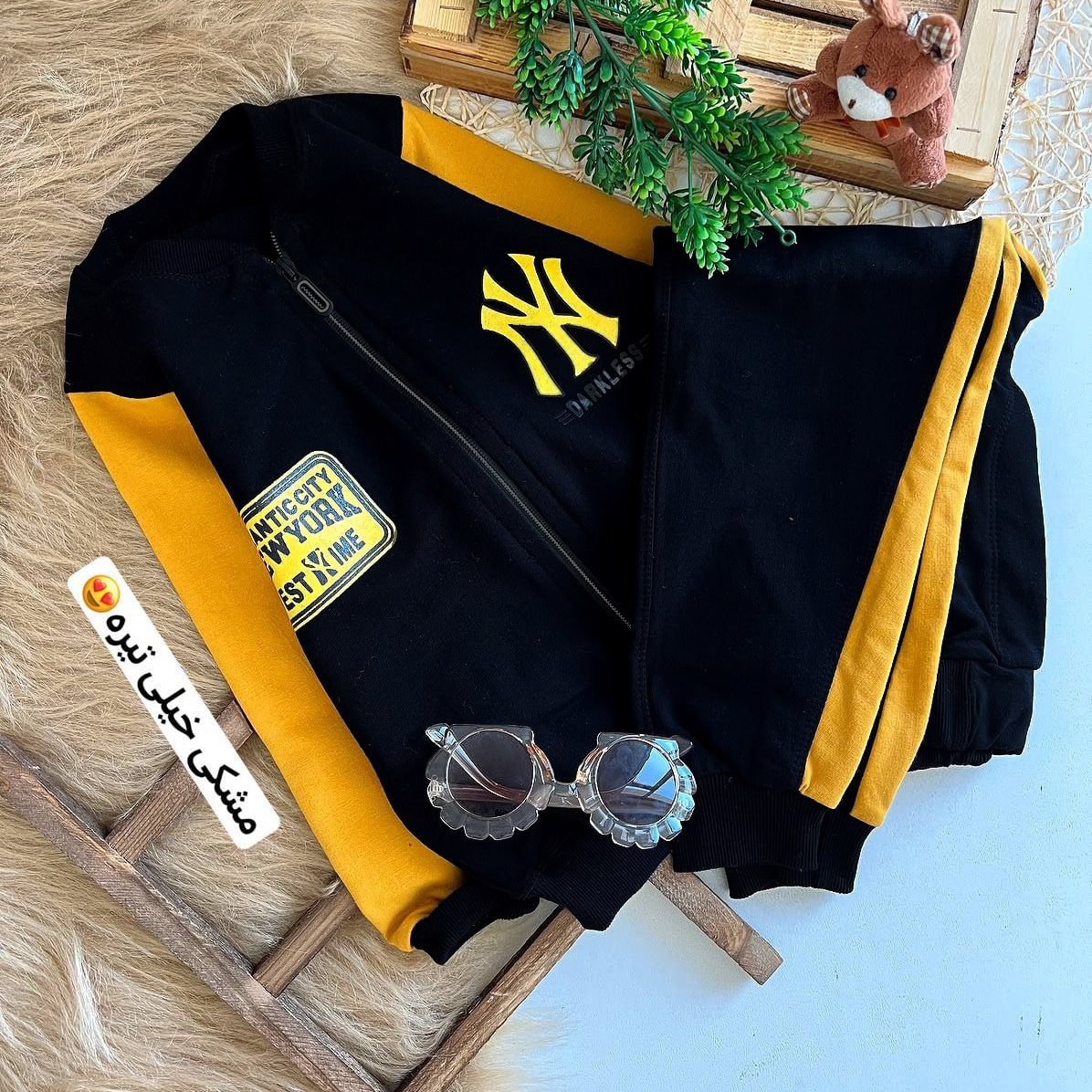 سویشرت شلوار اسپورت مشکی طرح NY مناسب 4 تا 11 سال