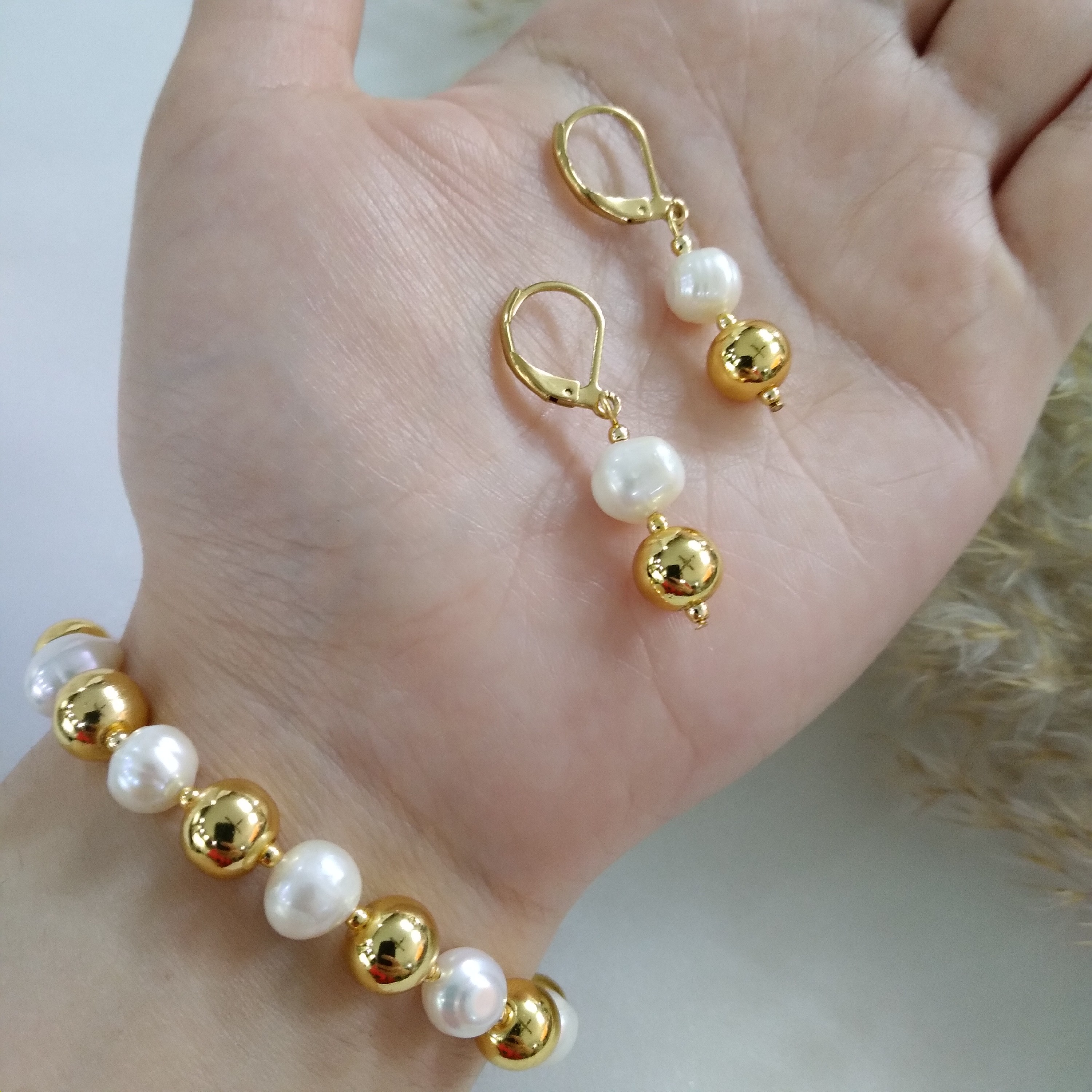 دستبند و گوشواره مروارید و حدید