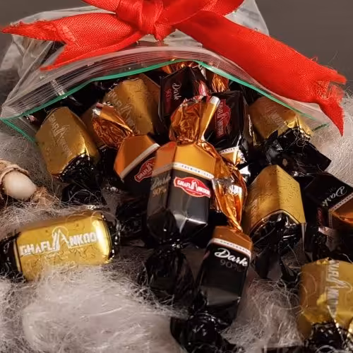 شکلات تلخ (760 گرمی) 2 تا بخر اشانتیون ببر مخصوص پذیرایی مامان جون ( دوسر پیچ )