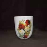 لیوان سفالی.رنگ سفید .طرح ترانسفر.کوره رفته.لعابداره.قابل شست وشو.ارتفاع10سانت.