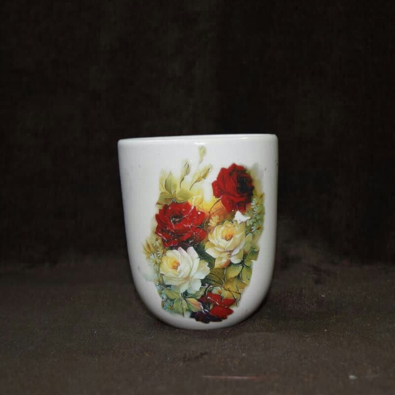 لیوان سفالی.رنگ سفید .طرح ترانسفر.کوره رفته.لعابداره.قابل شست وشو.ارتفاع10سانت.