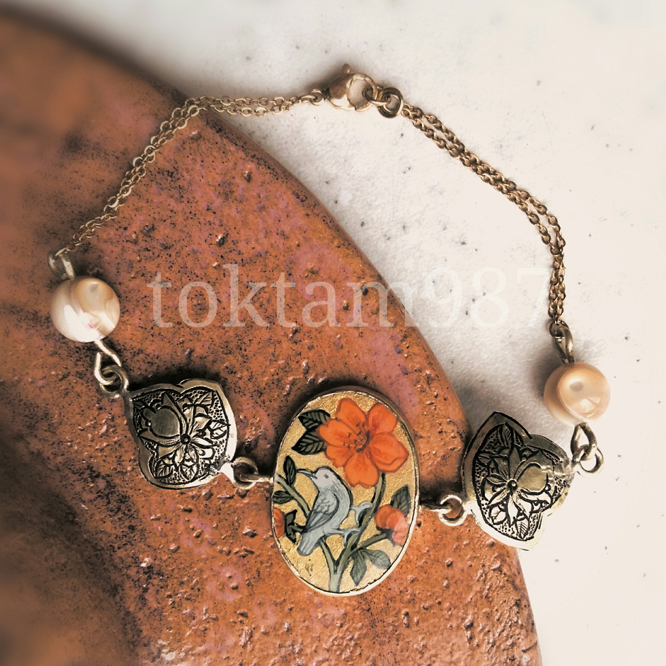 دستبند طرح گل و مرغ 