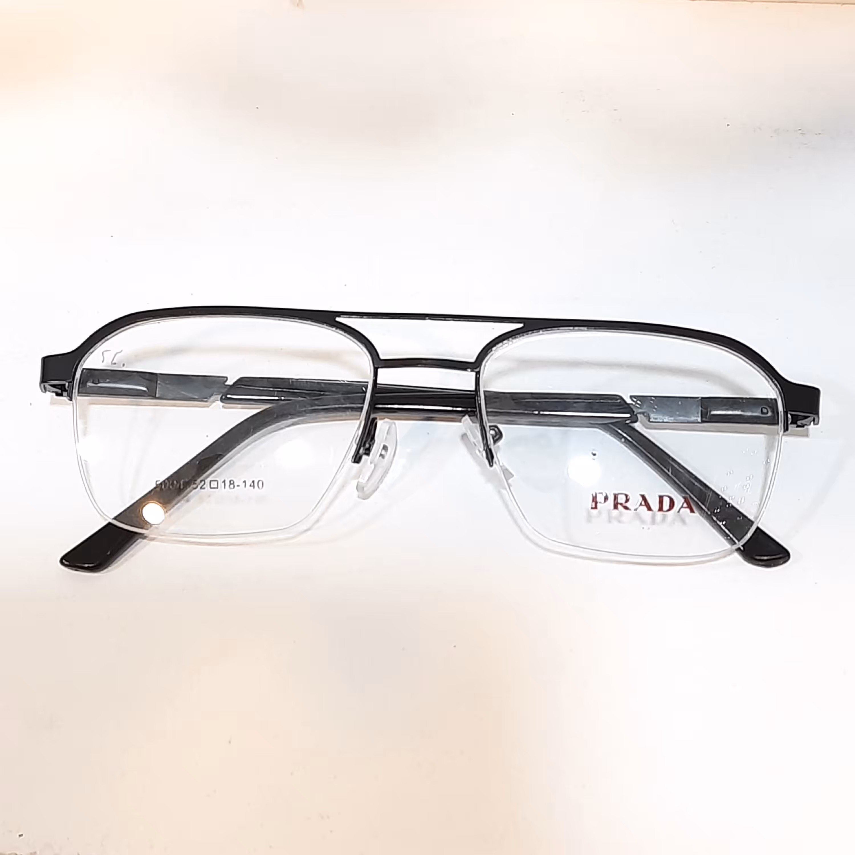 عینک طبی اسپرت نیمه قاب فلزی دو پل با قابلیت ساخت انواع عدسی طبی نمره دار