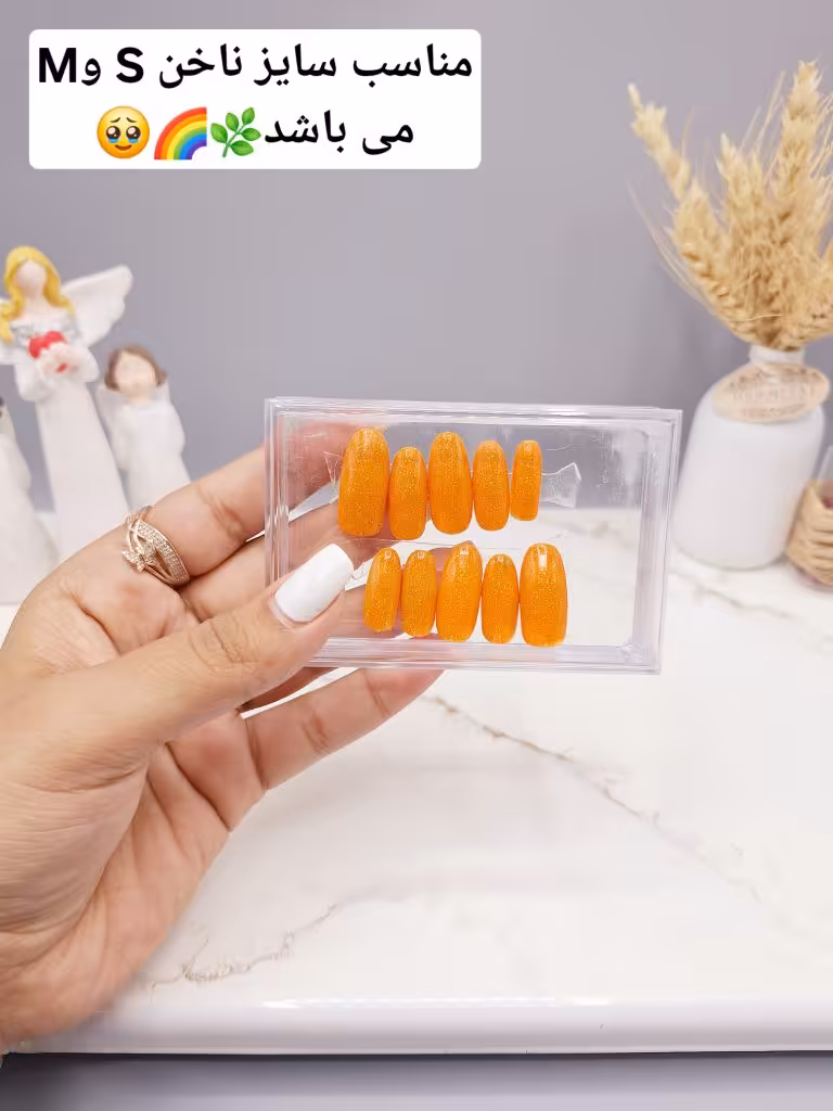 ناخن مصنوعی با مواد کاشت درجه 1 طرح ساده و شیک رنگ نارنجی شاین دار (به همراه پک اختصاصی)
