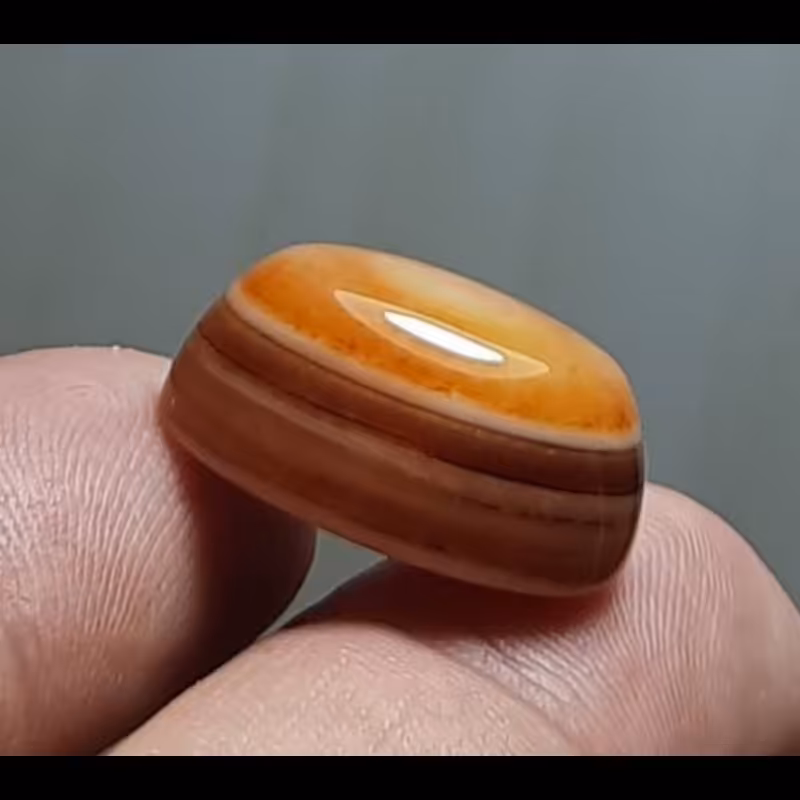 نگین باباقوری بالایه های موازی خاص و تک چشم معدنی فقط یک عدد 