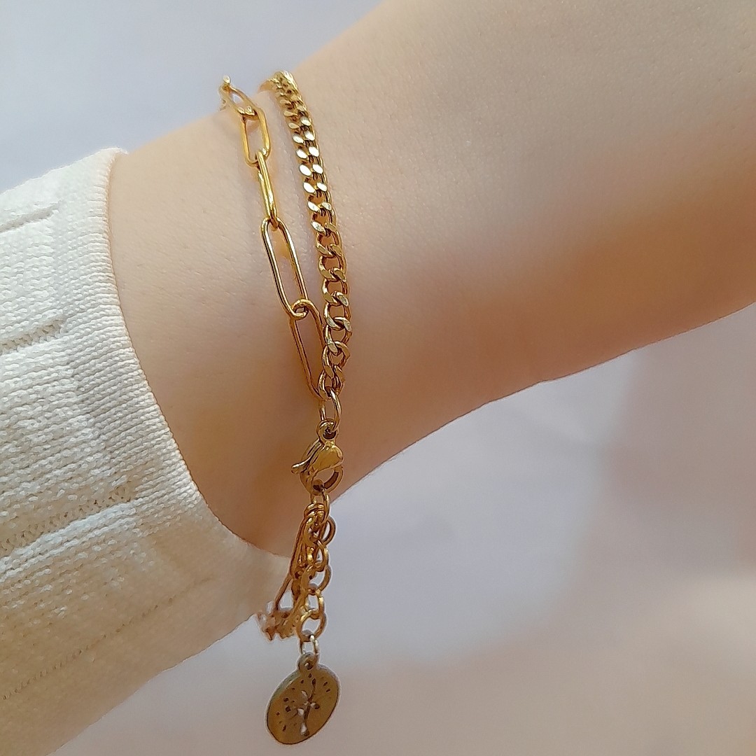 دستبند دولاین استیل طلایی، رنگ ثابت و بدون کوچکترین تغییر رنگ، کاملا تضمینی با بالاترین و بهترین کیفیت استیل 