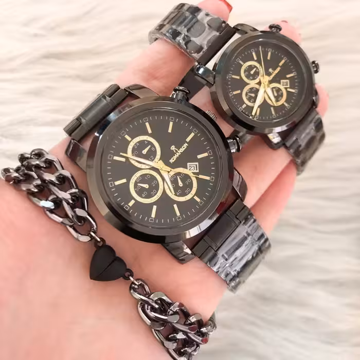 ساعت ست زنانه و مردانه رومانسون بند استیل مشکی همراه با ست دستبند  ( ارسال رایگان )