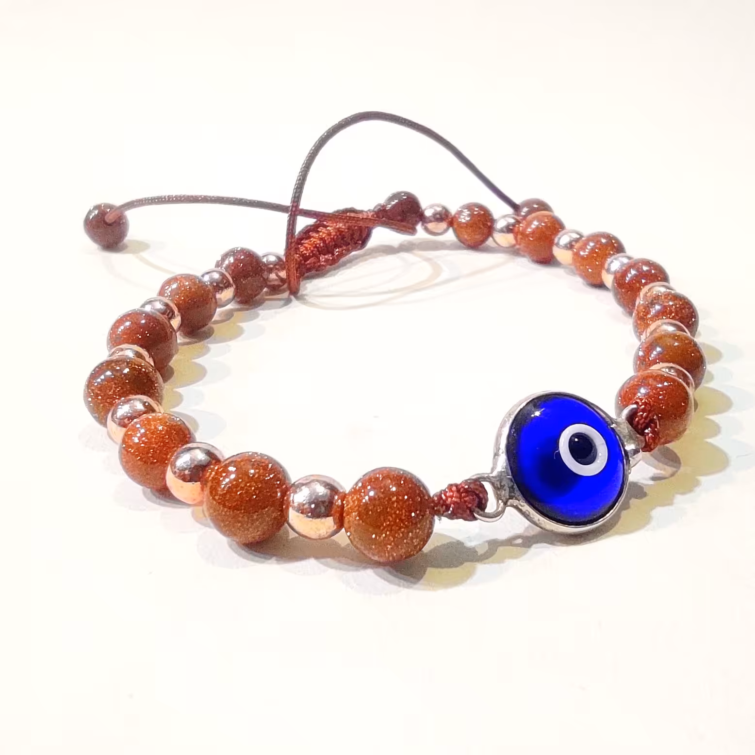 دستبند سنگ دلربا با پلاک نقره وچشم نظر 