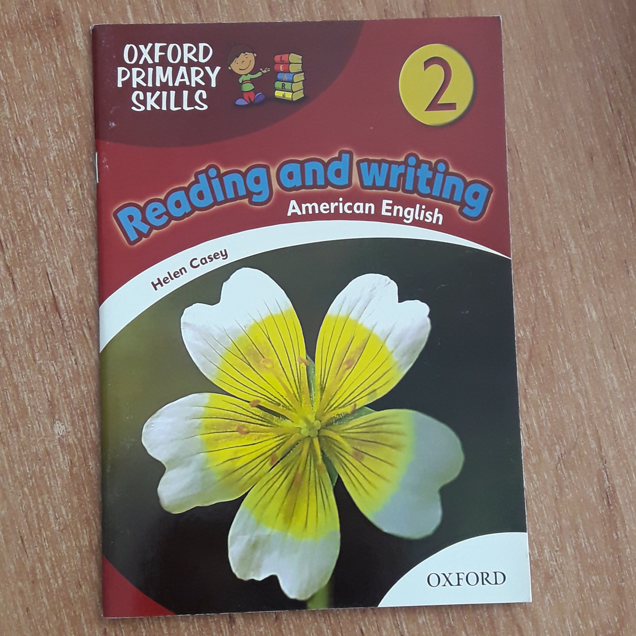کتاب امریکن ریدینگ اند رایتینگ AmArican Reading and Writing 2 منطبق با کتاب امریکن فمیلی فرندز 2