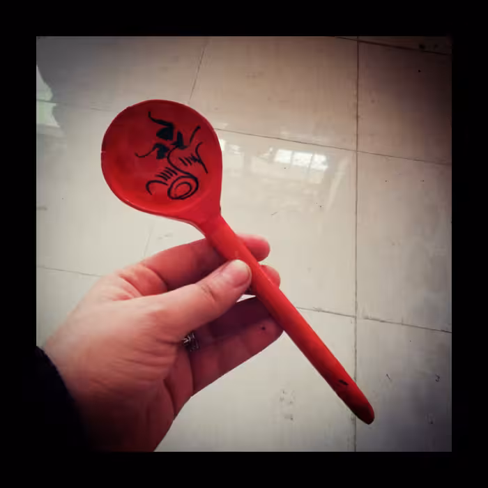 ملاقه چوبی طرحدار