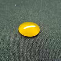 نگین عقیق زرد 10 (طول: 1.6 سانتی متر. عرض: 1.2 سانتی متر. ارتفاع: 0.4 سانتی متر.)