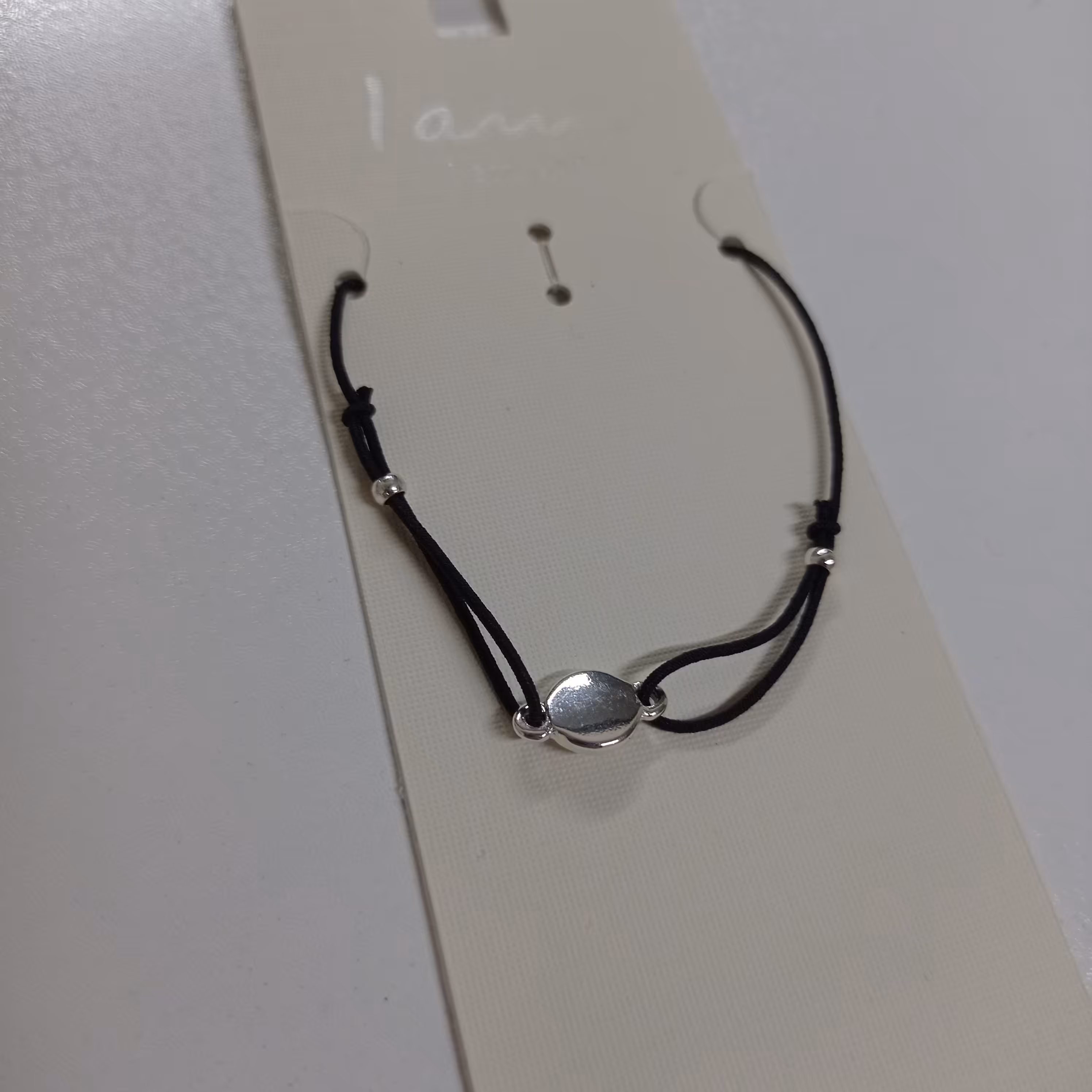 دستبند کشی  مشکی پلاک استیل رنگ ثابت