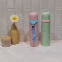 فلاسک چایی0.6لیتری درب پیچی جنس استیل نگهداری گرماتا 6ساعت نگهداری دما دارای بند