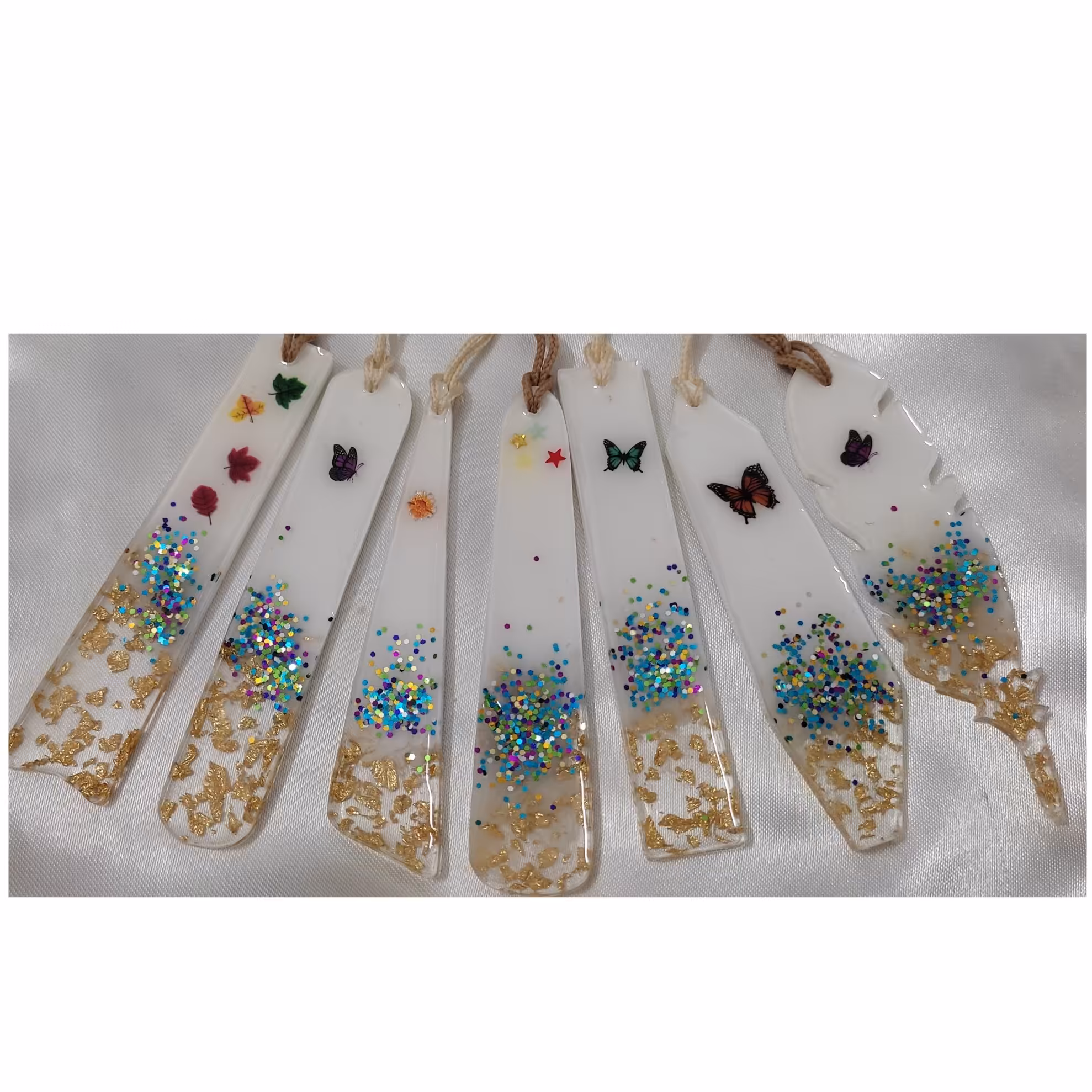 نشانگر رزینی  دخترانه  طرح پولکهای رنگی وگل و پروانه 