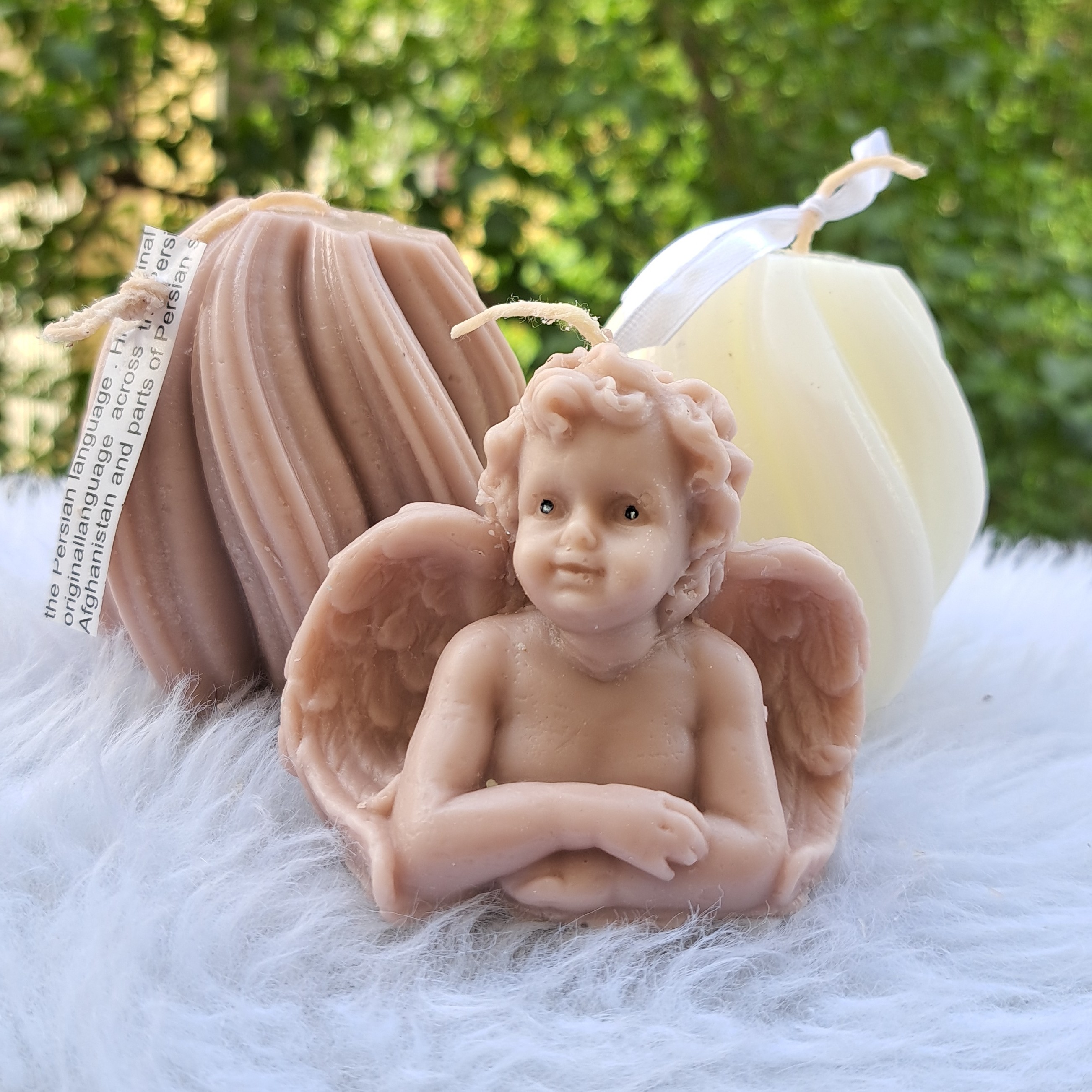 شمعه فرشته و شمع بوی دریا قابل اجرا در هر رنگی پارافین مصرفی یک درصد سفید فرشته 8 سانت بوی دریا 10 سانت