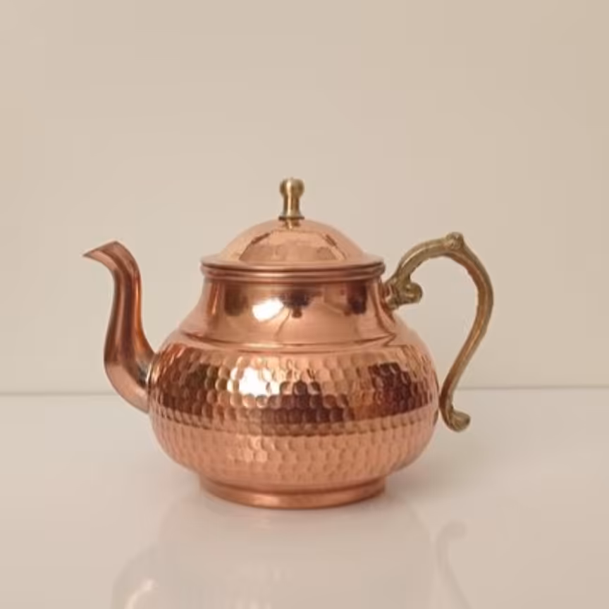 قوری مسی نیم لیتری دسته برنجی طرح توپی نانو شده 

