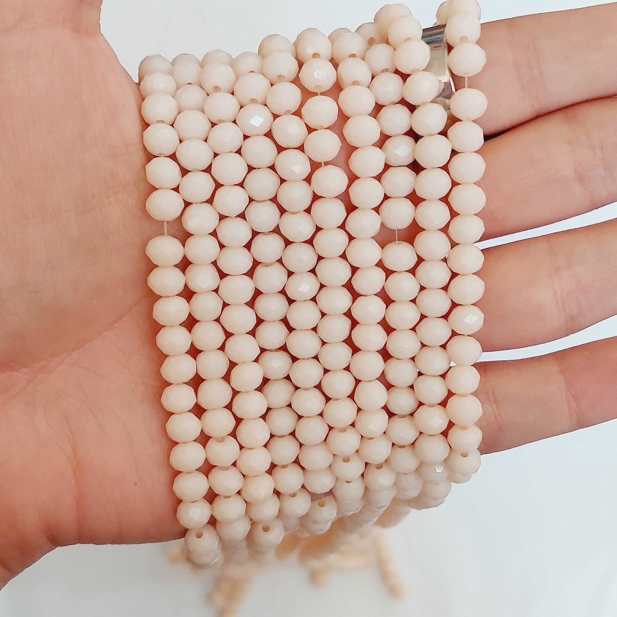 کریستال سنگی سایز6 شیری رنگ(تقریبا90دونه)