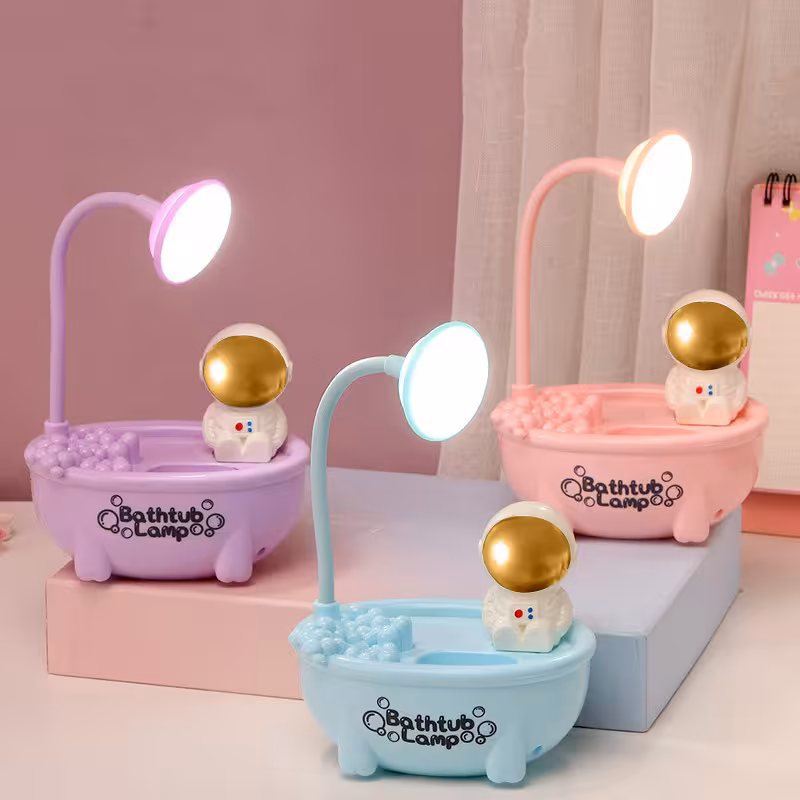 چراغ مطالعه و خواب جاقلمی و تراش دار طرح وان حمام فضانورد