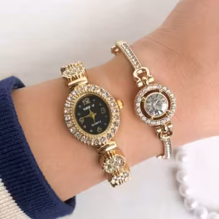 ساعت بند استیل زنانه به همراه دستبند