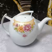 قوری چینی نگین مینی تهیه شده از بهترین مواداولیه پذیرایی چای دمنوش طراحی زیبا 