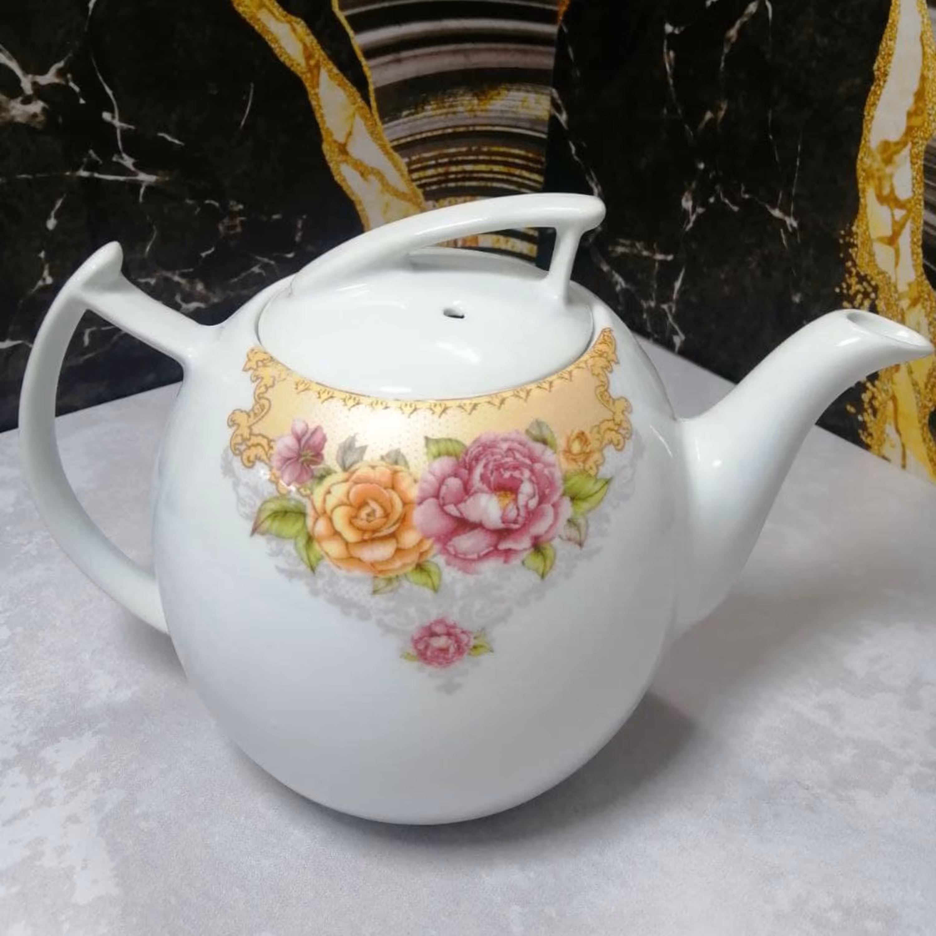 قوری چینی نگین مینی تهیه شده از بهترین مواداولیه پذیرایی چای دمنوش طراحی زیبا 