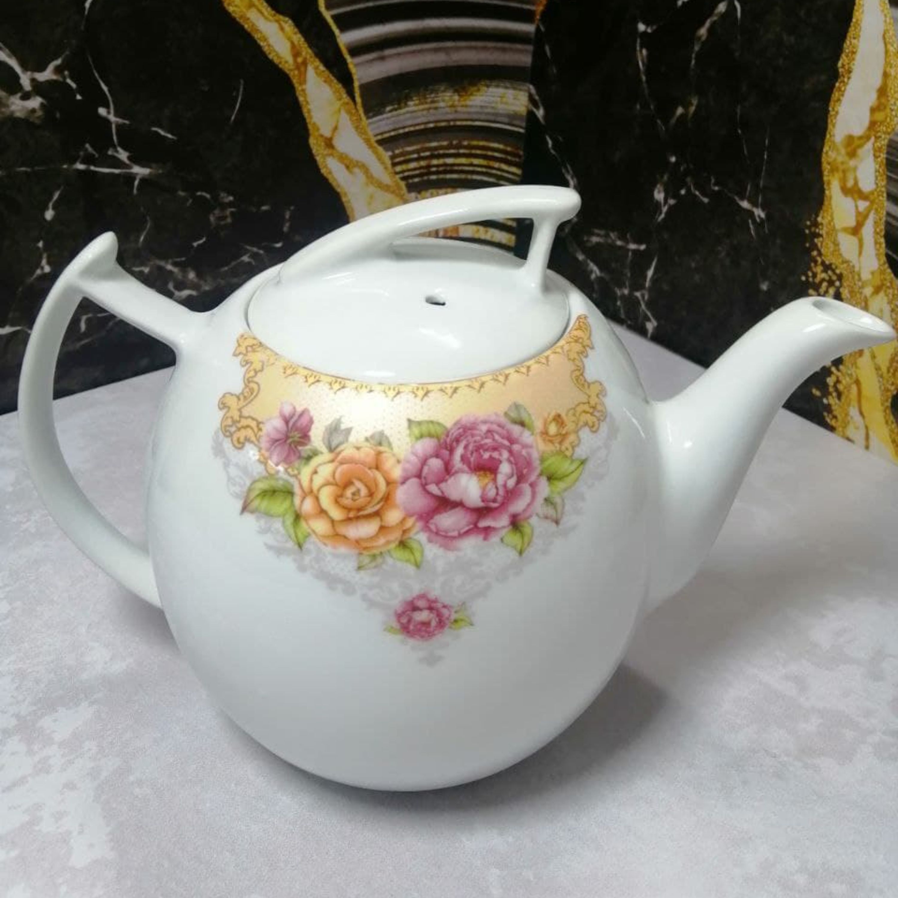 قوری چینی نگین مینی تهیه شده از بهترین مواداولیه پذیرایی چای دمنوش طراحی زیبا