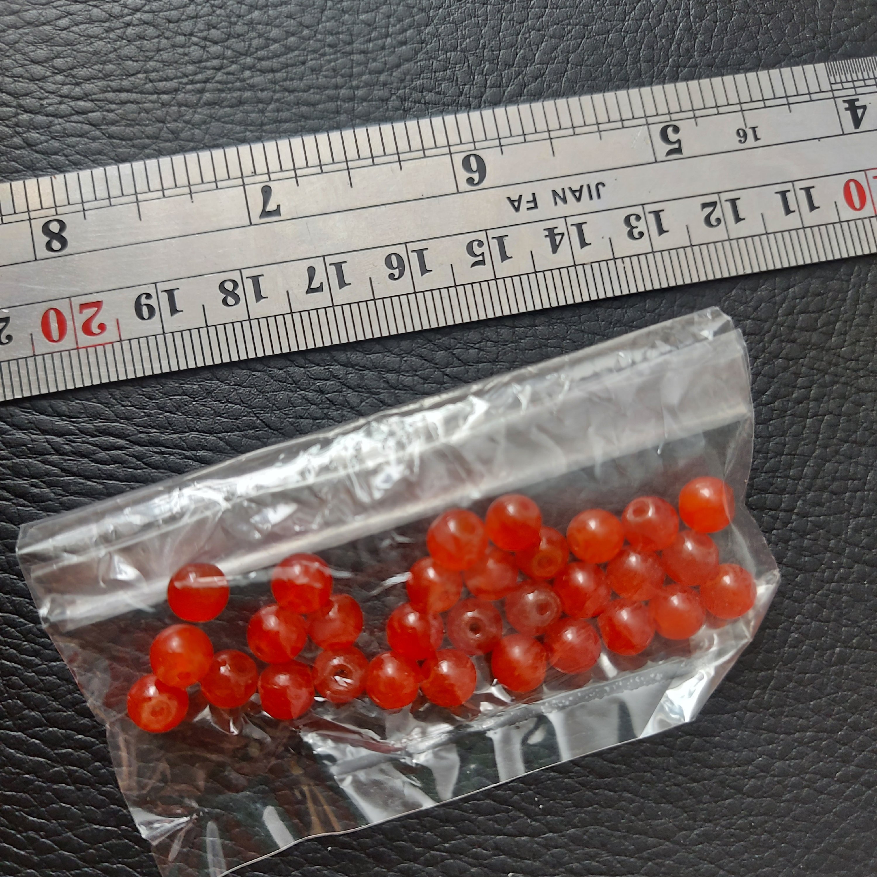 مروارید سنگی نارنجی عقیقی سایز 6 میل بسته 30 عدذی