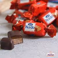 شکلات مغزدار کاراملی یک کیلویی نادو  با  روکش کاکائویی  (ناقو نادو )