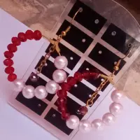 گوشواره زنانه و دخترانه مروارید و کریستال صورتی رنگ ثابت حلقه ای دست ساز نیل