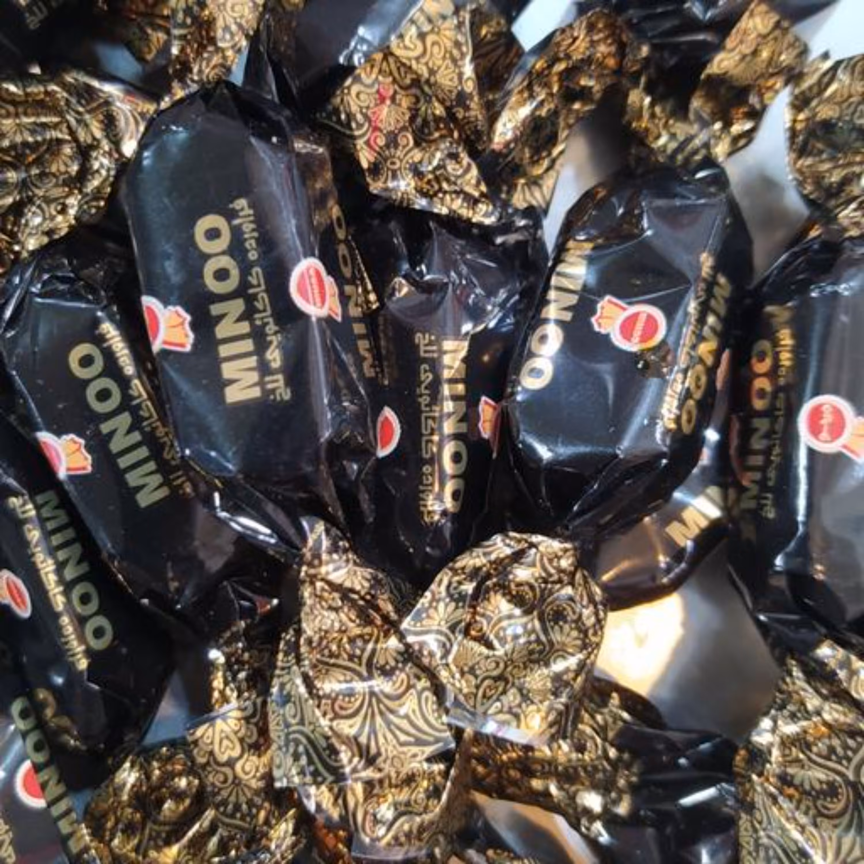 شکلات تلخ مینو خوشمزه با کیفیت 200 گرمی غرفه آجیل خشکبار مهران