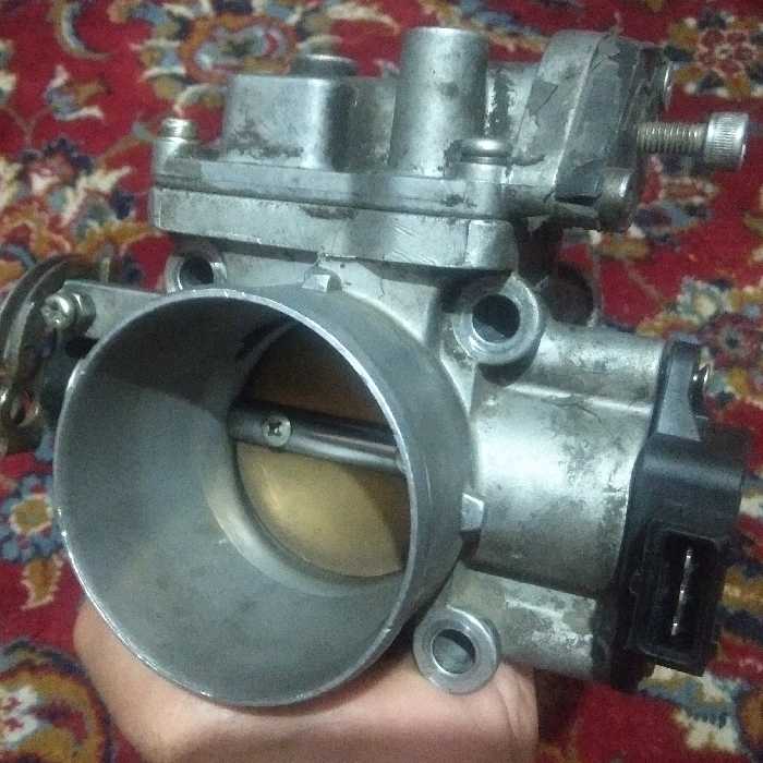 دریچه گاز نیسان همراه با سنسور دریچه گاز و سنسور استپر دستی ریگلاژی مکانیکی اسپرت(دریچه استوکه)