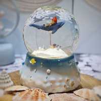 گوی موزیکال باتری خور پسرک دلفین سوار