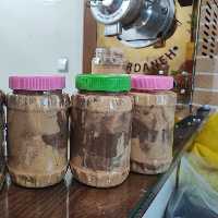 کره بادام زمینی مخلوط با کنجد ، کاکائو ، سایر مغزها با درصد کم 